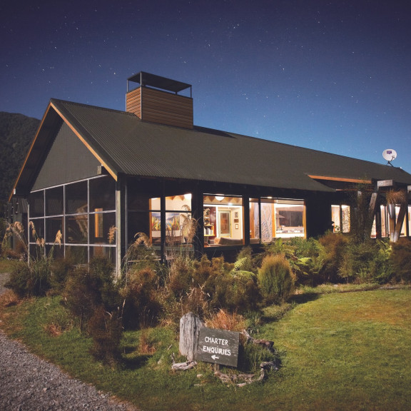 HFT Martins Bay Waitai Lodge At Night jpg Large